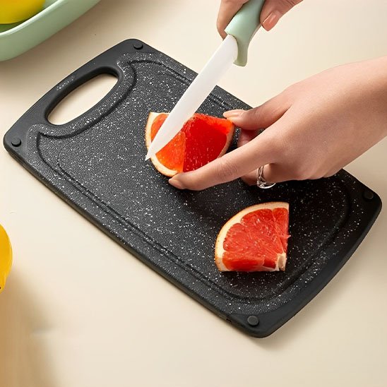 Planche a decouper polyvalent